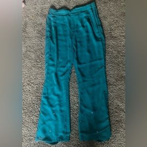 Teal blue pants with bead decoration